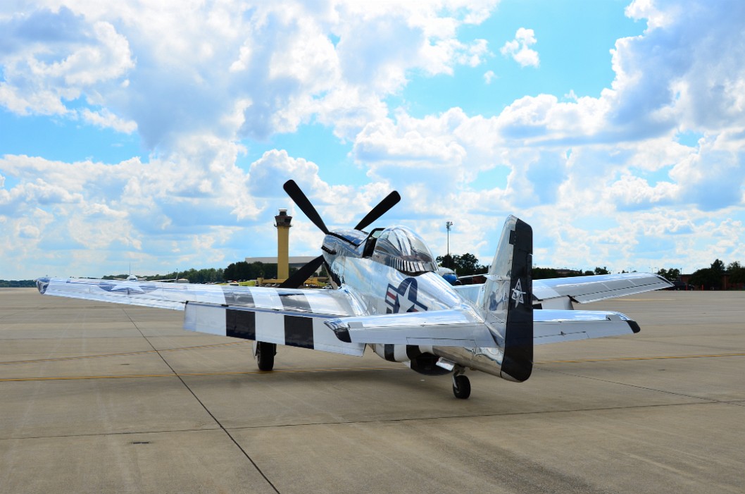 P-51D Mustang and Puffed Clouds