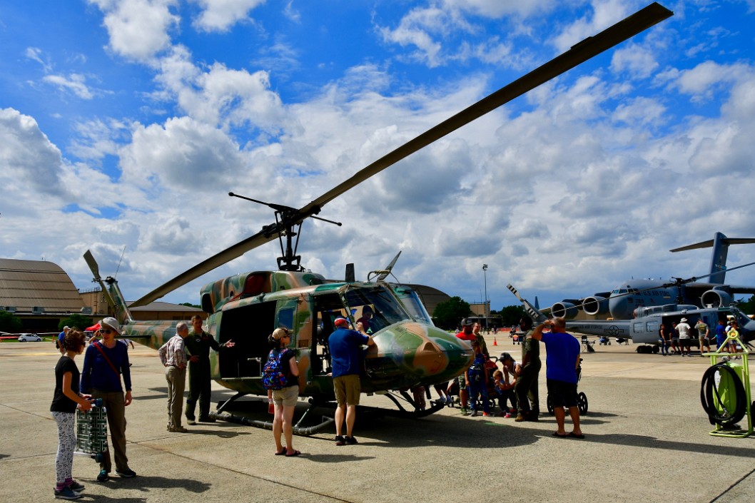 Folks Checking Out a Huey