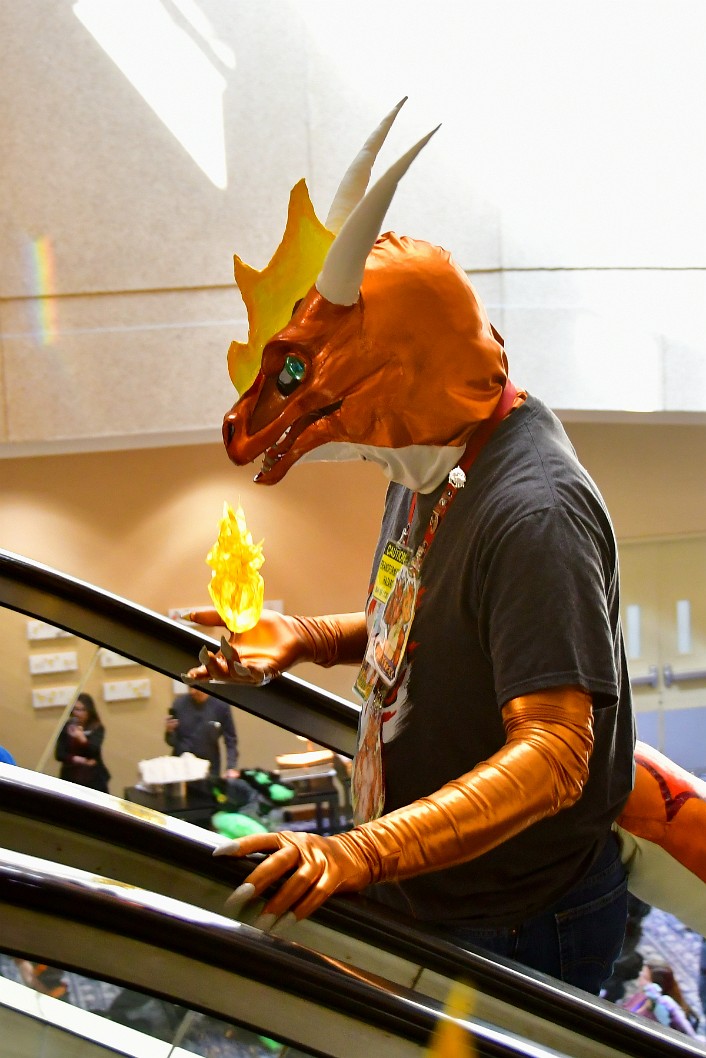 A Golden Dragon With Flame in Hand