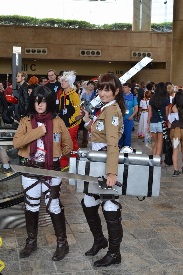 Mikasa and Sasha With Her Swords Out Mikasa and Sasha With Her Swords Out