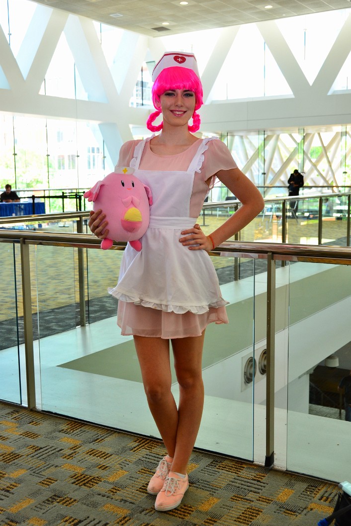 Nurse Joy in Pink With a Chansey Nurse Joy in Pink With a Chansey