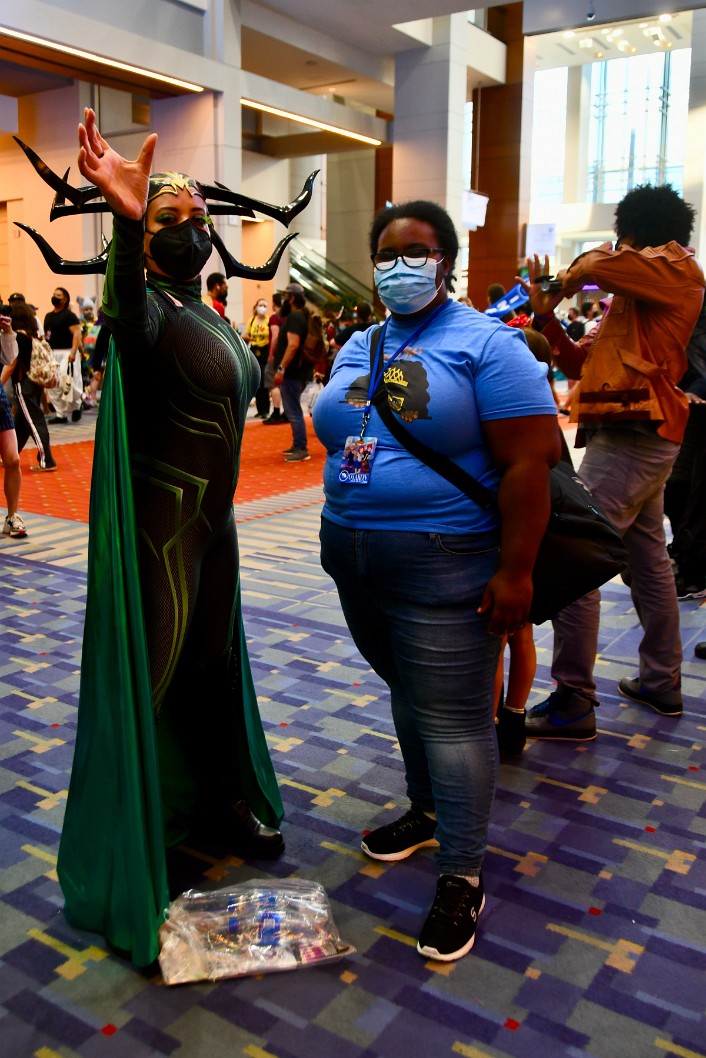 Hela Reaching Up With a Fan
