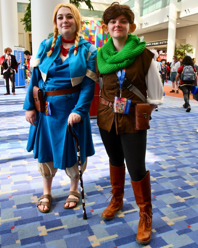 Marcille and Chilchuck Posing Between Dungeon Crals